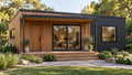 Alder Cove GN-104 modern detached ADU concept: cedar and charcoal facade, covered terrace and wide sliding glass door.